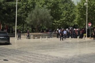 Protesters throw eggs at Albanian lawmakers' motorcades outside Parliament