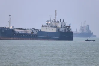 Iran warns U.S. of "devastating response" if attacks continue