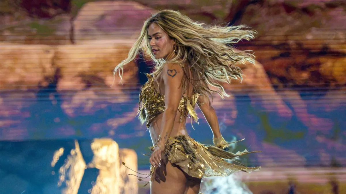 Karol G grabbed by fan after stage breach during Canada concert