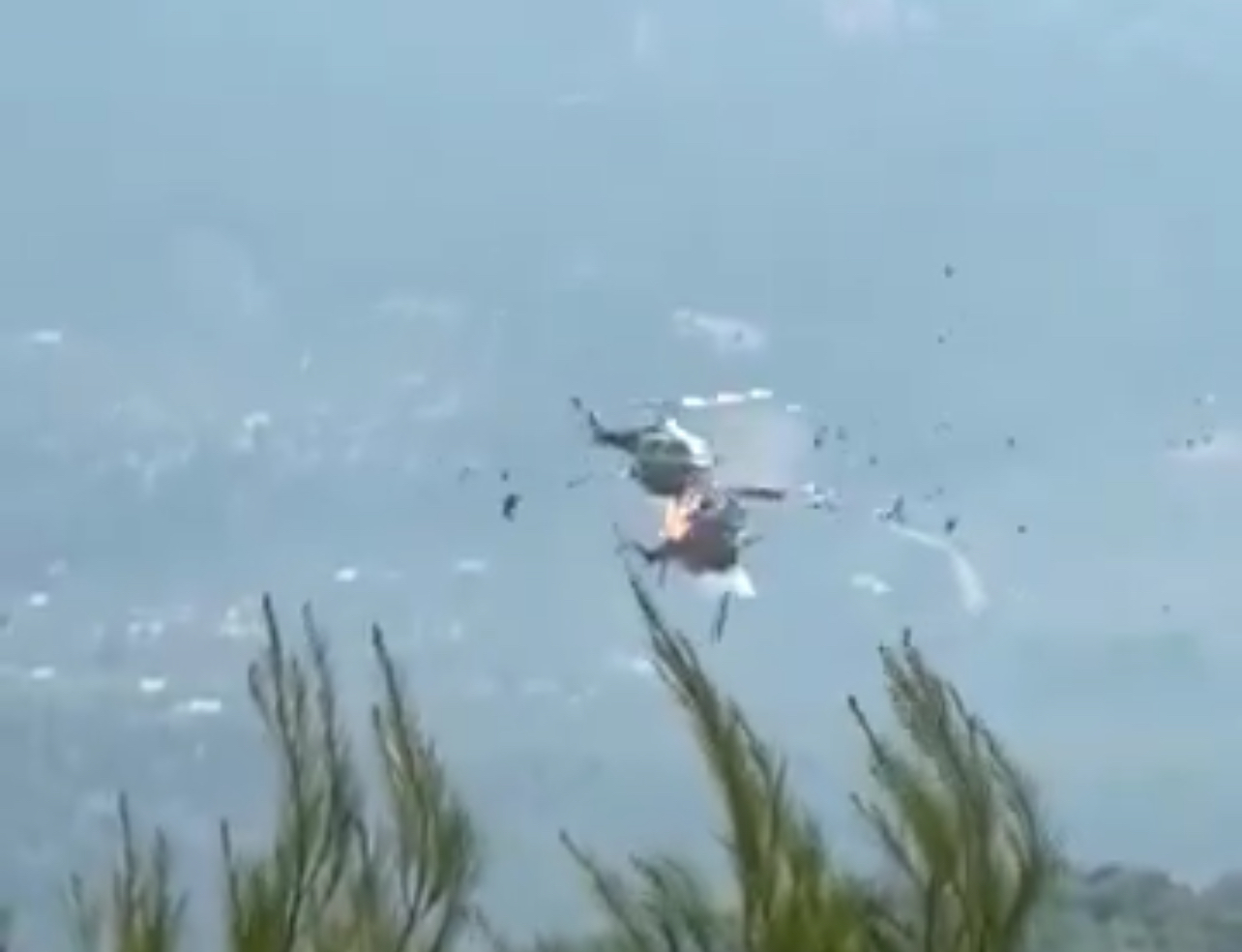 Two firefighting helicopters collide during wildfire operation in Greece