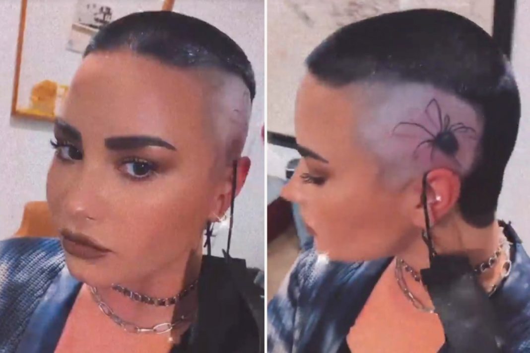 Demi Lovato causa revuelo tras tatuarse una araña en la cabeza