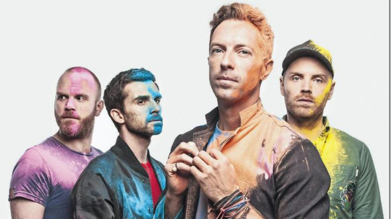 Integrantes de Coldplay se dan un “baño de pueblo” antes de concierto en el Olímpico