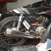 Policía apresa dos personas y les ocupa motocicleta y dos pistolas en Santiago - Noticias de hoy en República Dominicana | De Último Minuto