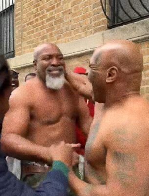 Mike Tyson se quita la camiseta para pelear en la calle con Shannon Briggs
